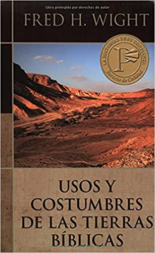 Portada del libro 'Usos y Costumbres de las Tierras Bíblicas' por Fred H. Wight, con la imagen de un paisaje desértico que evoca las regiones mencionadas en la Biblia y el nombre del autor en la parte superior.