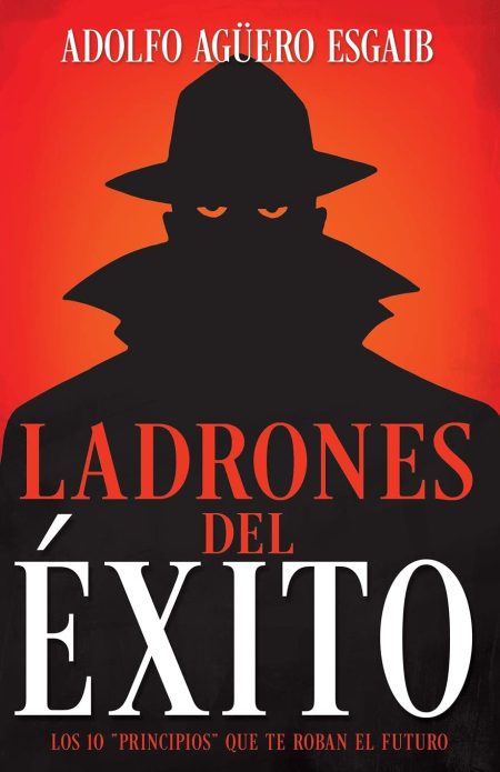 La imagen muestra la portada de un libro con un fuerte contraste de colores, utilizando principalmente el rojo y el negro. En la parte superior de la portada aparece el nombre del autor ADOLFO AGÜERO ESAGIB en letras blancas. Centralmente, hay una gran silueta negra de una figura con sombrero, con ojos que parecen observar cautelosamente al lector. Las letras de LADRONES DEL ÉXITO son prominentes y están dispuestas en la parte central de la imagen en un grande y audaz tipo de letra negro con bordes rojos, transmitiendo un mensaje de poder y misterio. El subtítulo en la parte inferior, también en letras negras, informa de la temática LOS 10 'PRINCIPIOS' QUE TE ROBAN EL FUTURO, lo que sugiere una exploración de los obstáculos o malas prácticas que podrían impedir el éxito personal o profesional.