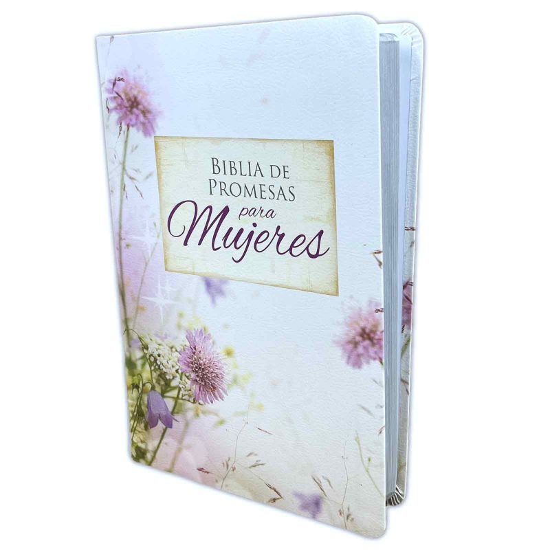 un libro con la portada titulada 'Biblia de Promesas para Mujeres'. El diseño de la portada presenta delicadas flores silvestres en tonos púrpuras y verdes pastel, transmitiendo una sensación de calma y contemplación. El libro parece nuevo y cuenta con un lomo visible que sugiere que está sin abrir. El estilo y el tema de la portada indican que el libro está dirigido a un público femenino, posiblemente como una fuente de inspiración y consuelo espiritual.