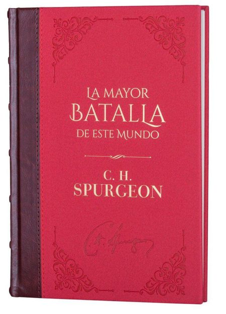 Fotografía del libro rojo 'La Mayor Batalla de Este Mundo' por C. H. Spurgeon con bordes marrones y adornos ornamentales en la cubierta.