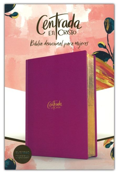 Imagen de la portada de la Biblia devocional titulada 'Centrada en Cristo' para mujeres, en tono magenta con detalles dorados, presentada sobre un fondo con estampado floral abstracto en tonos rosas y amarillos.