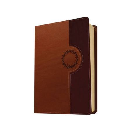 Cuaderno cerrado con tapa de cuero en tonos marrón claro y oscuro, con un detalle decorativo circular cosido en el centro.