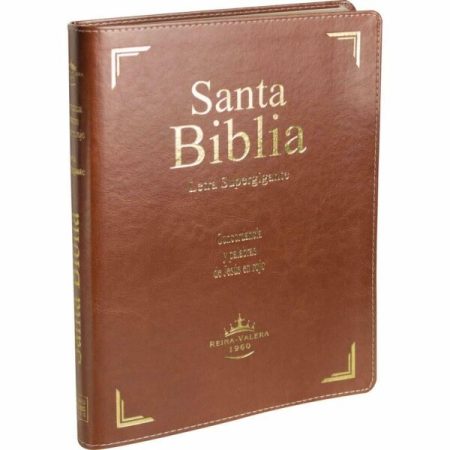 Fotografía de una Santa Biblia versión Reina-Valera de 1960 con tapa de cuero marrón y letras doradas.