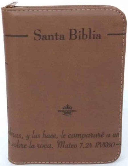 ** Biblia de tapa marrón con cierre de cremallera y inscripción en la portada.