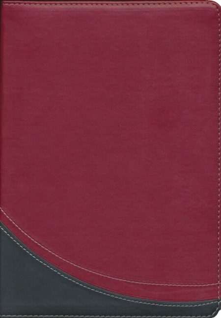 ** Cuaderno con cubierta de color borgoña y detalle curvo en la esquina inferior.