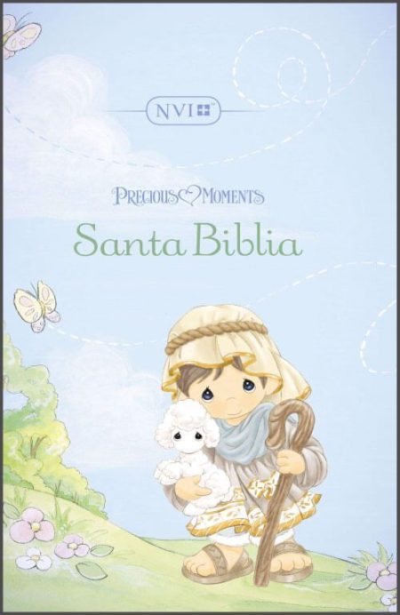 ** Ilustración de un niño pastor con un corderito en un campo florido, en la portada de una edición infantil de la Santa Biblia de Precious Moments.