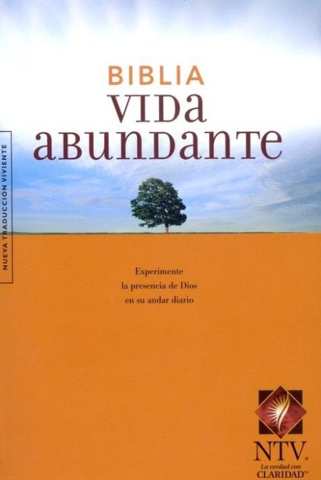 ** Portada de la Biblia Vida Abundante con un fondo de cielo azul y un árbol solitario.