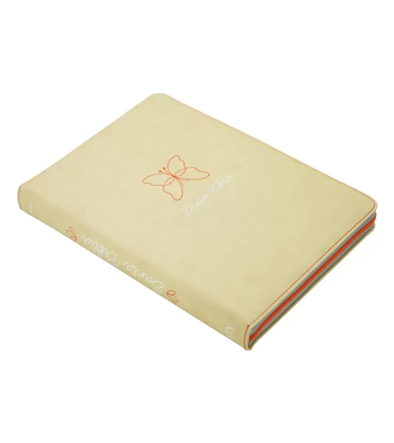 ** Cuaderno de tapa dura en color crema con un diseño de mariposa naranja en la portada.