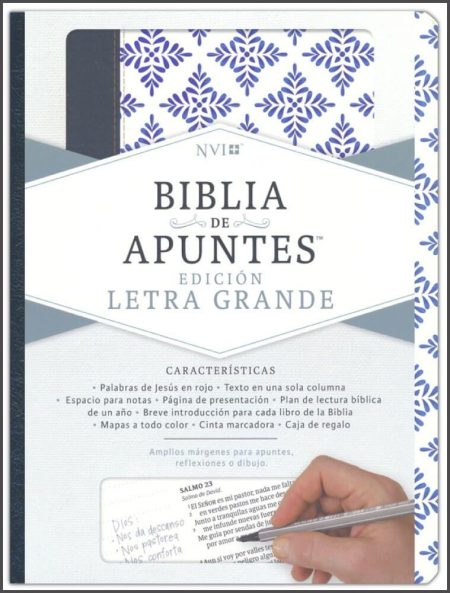 ** Portada de la Biblia de Apuntes NIV edición letra grande, con diseño floral azul y una mano escribiendo en una de las páginas.