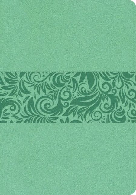 ** Cuaderno verde con diseño floral en el centro.
