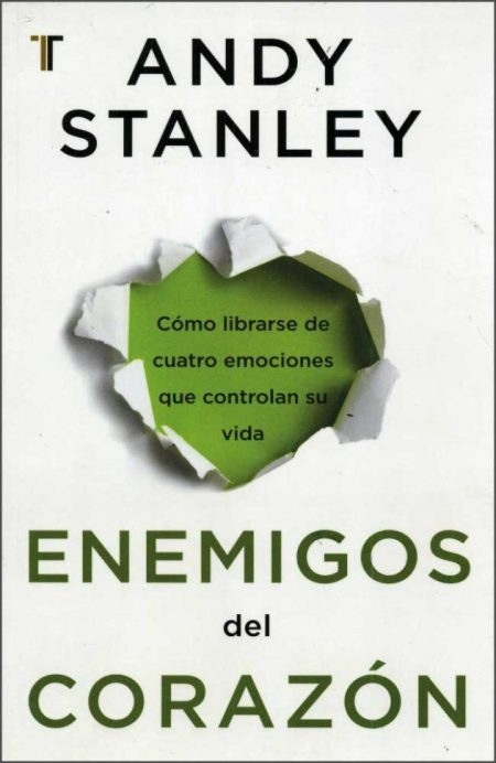 Enemigos del Corazón" de Andy Stanley con un agujero en el papel revelando un mensaje.