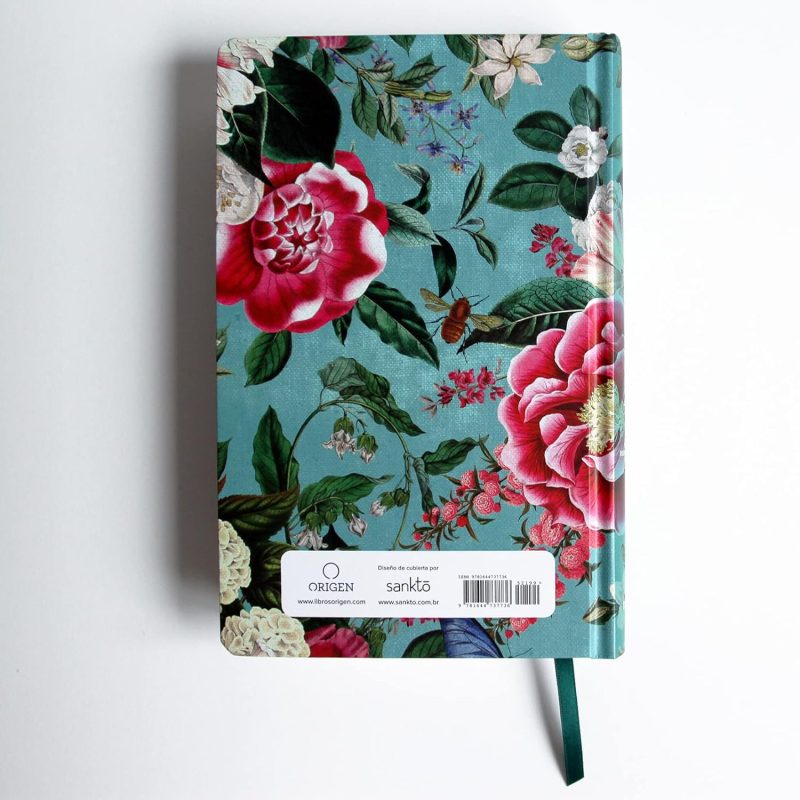 ** Cuaderno con cubierta floral verde y rosa.