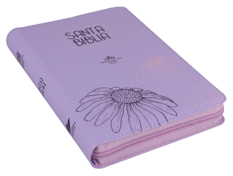 ** Biblia color lavanda con ilustración de flor en la cubierta.