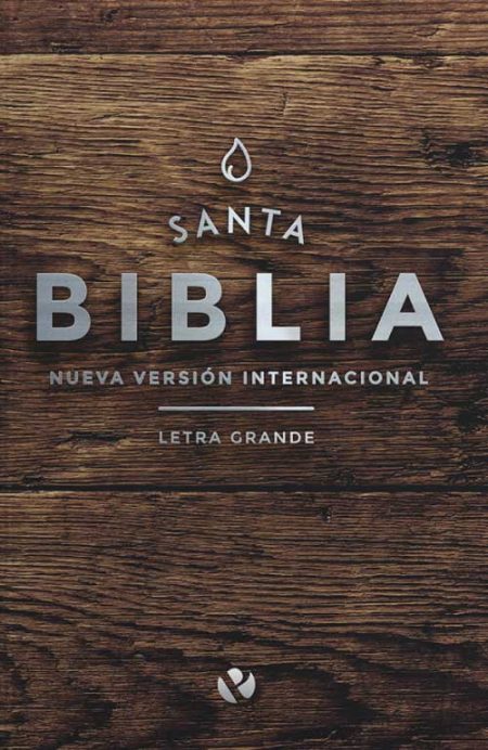 **Texto alt:** Portada de la Biblia Nueva Versión Internacional con fondo de madera.
