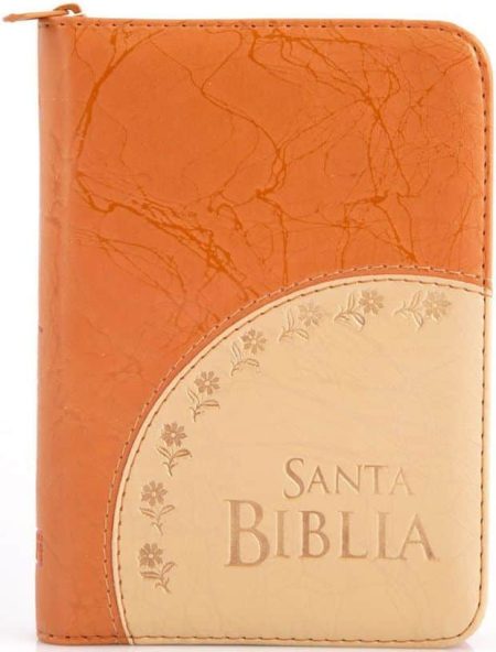 ** Biblia con cubierta de cuero marrón anaranjado y beige con diseño floral.