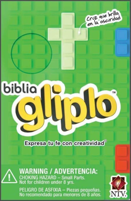 ** Caja verde de la Biblia Gliplo con piezas de construcción. La caja incluye una cruz que brilla en la oscuridad y advertencias de seguridad.