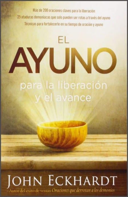 El Ayuno: para la liberación y el avance" de John Eckhardt. Muestra un cuenco dorado sobre una superficie de madera.