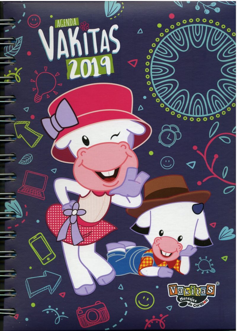 ** Portada de una agenda escolar de 2019 con dos personajes de vacas animadas, una con sombrero rojo y otra con sombrero marrón sobre un fondo oscuro decorado con dibujos coloridos.