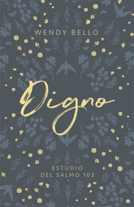 Digno" de Wendy Bello con diseño floral dorado sobre un fondo azul oscuro.