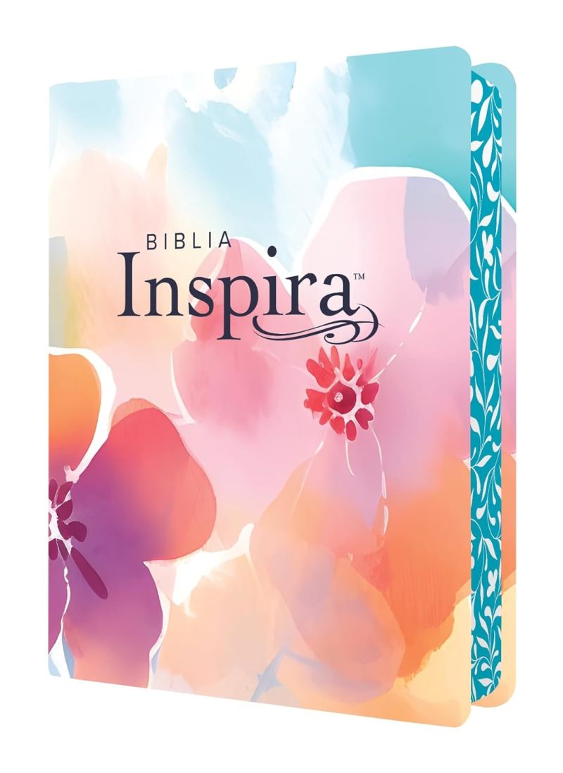 ** Portada de la Biblia Inspira decorada con un diseño floral colorido.